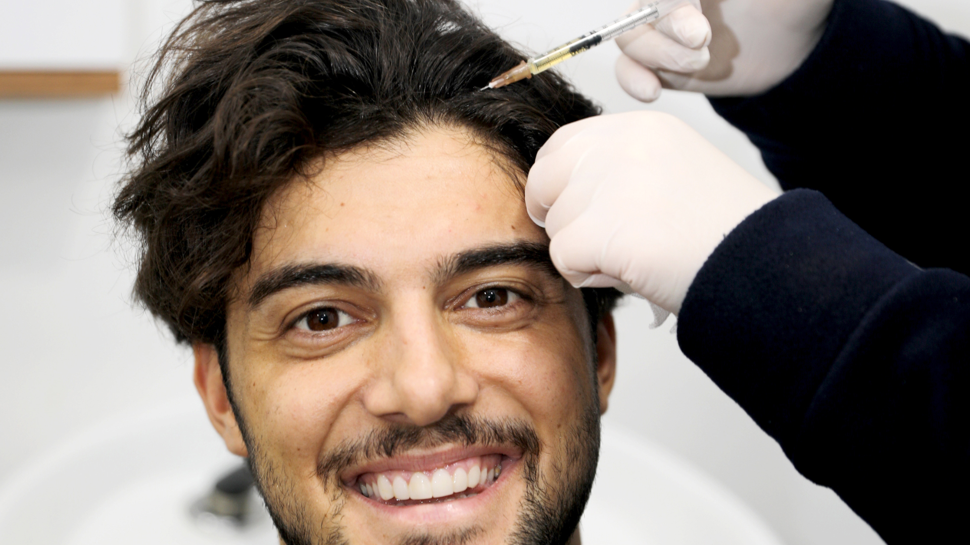 A person having a PRP hair treatment