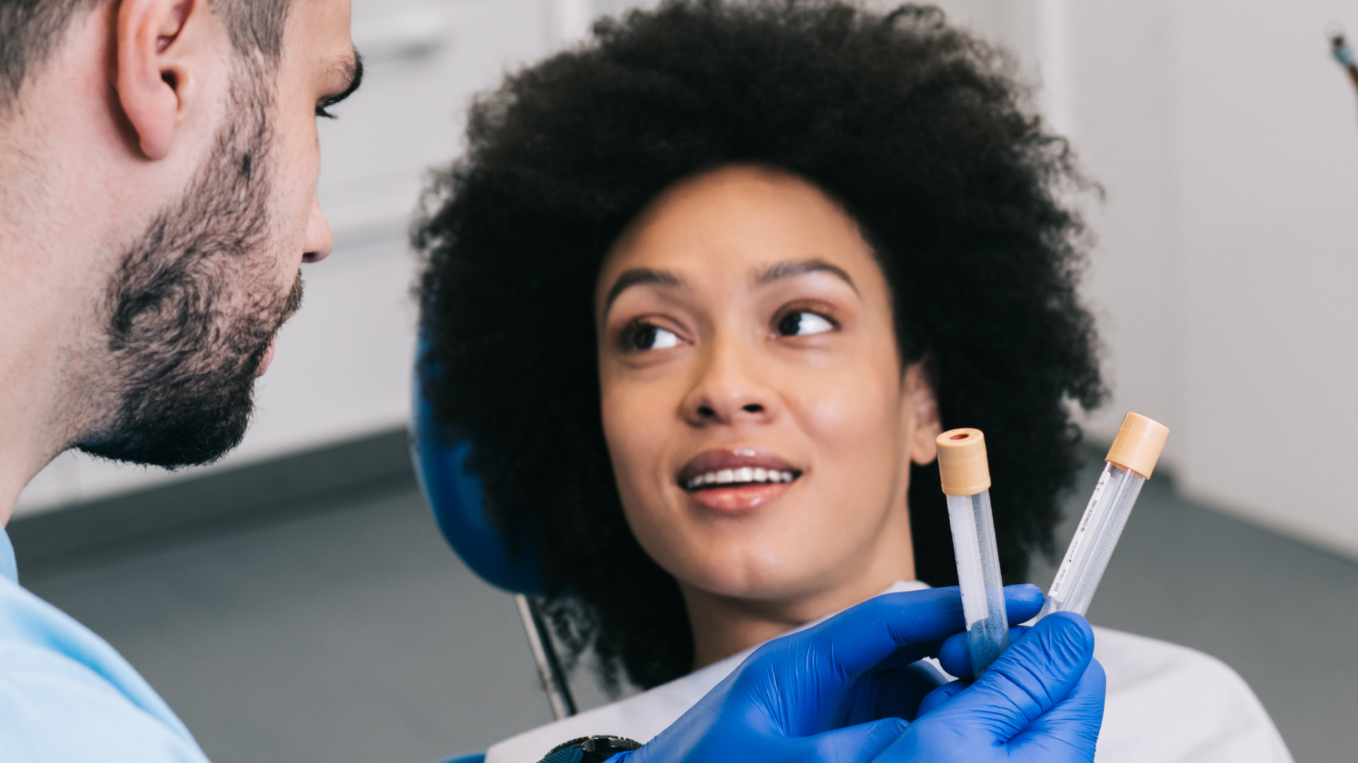 a woman with kinky hair having a PRP treatment