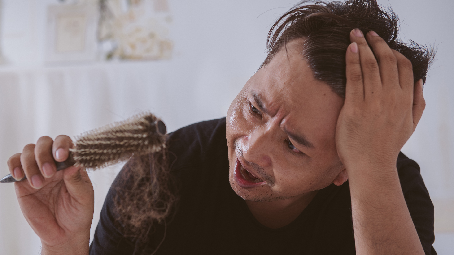 a man loses his hair, the possible cause: androgenetic alopecia